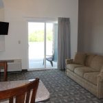 living room in Crystal Inn & Suites Towanda, PA hotel room
